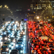 Cars slowly move along a bridge in traffic jam in central Moscow on December 11, 2018.